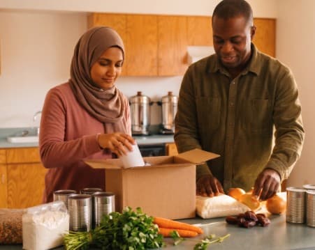 Volunteers preparing fresh vegetables in the masjid kitchen